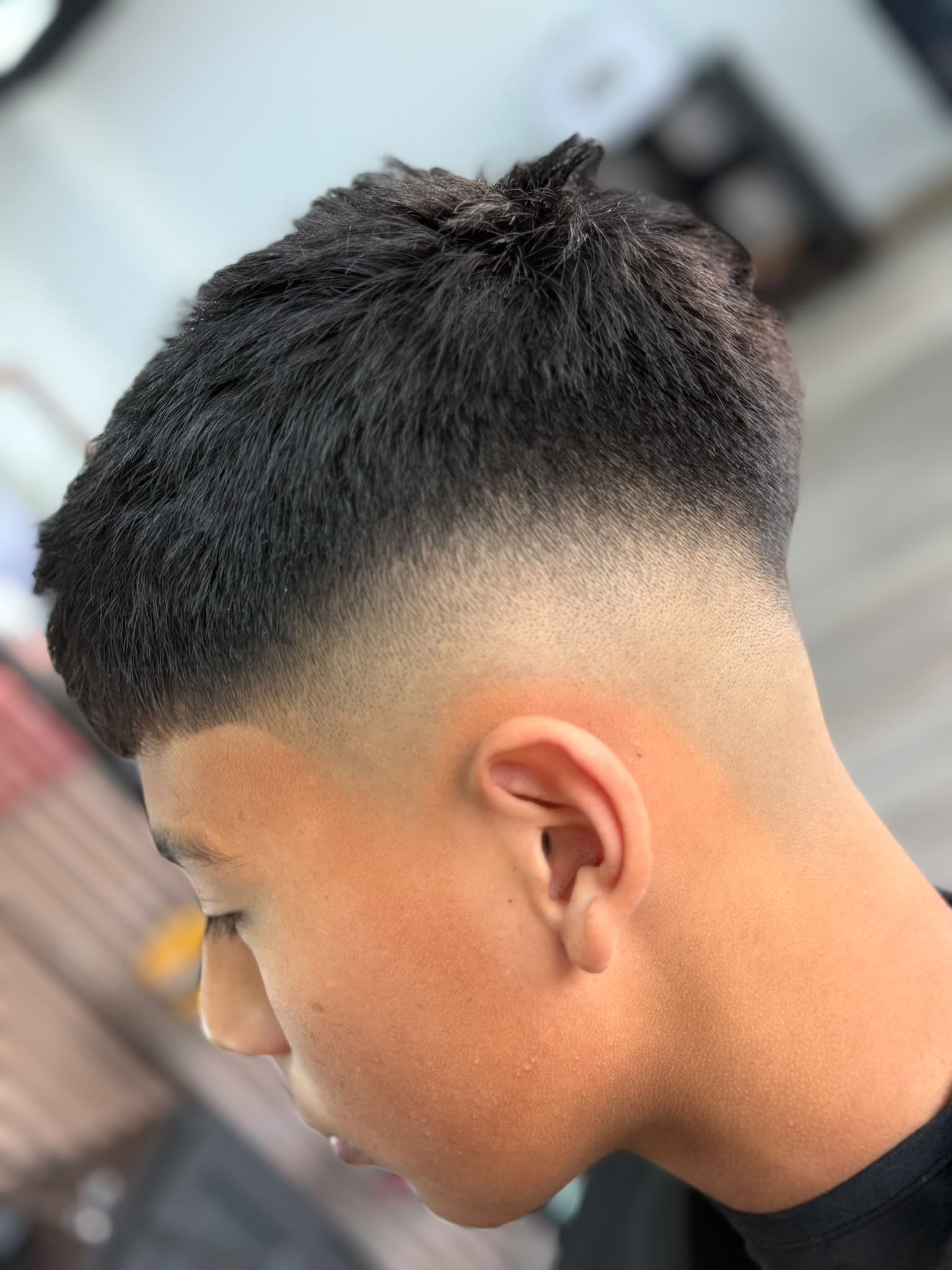 Corte fade y peinado en Academy Rafa Vargas Barberia Santander 5